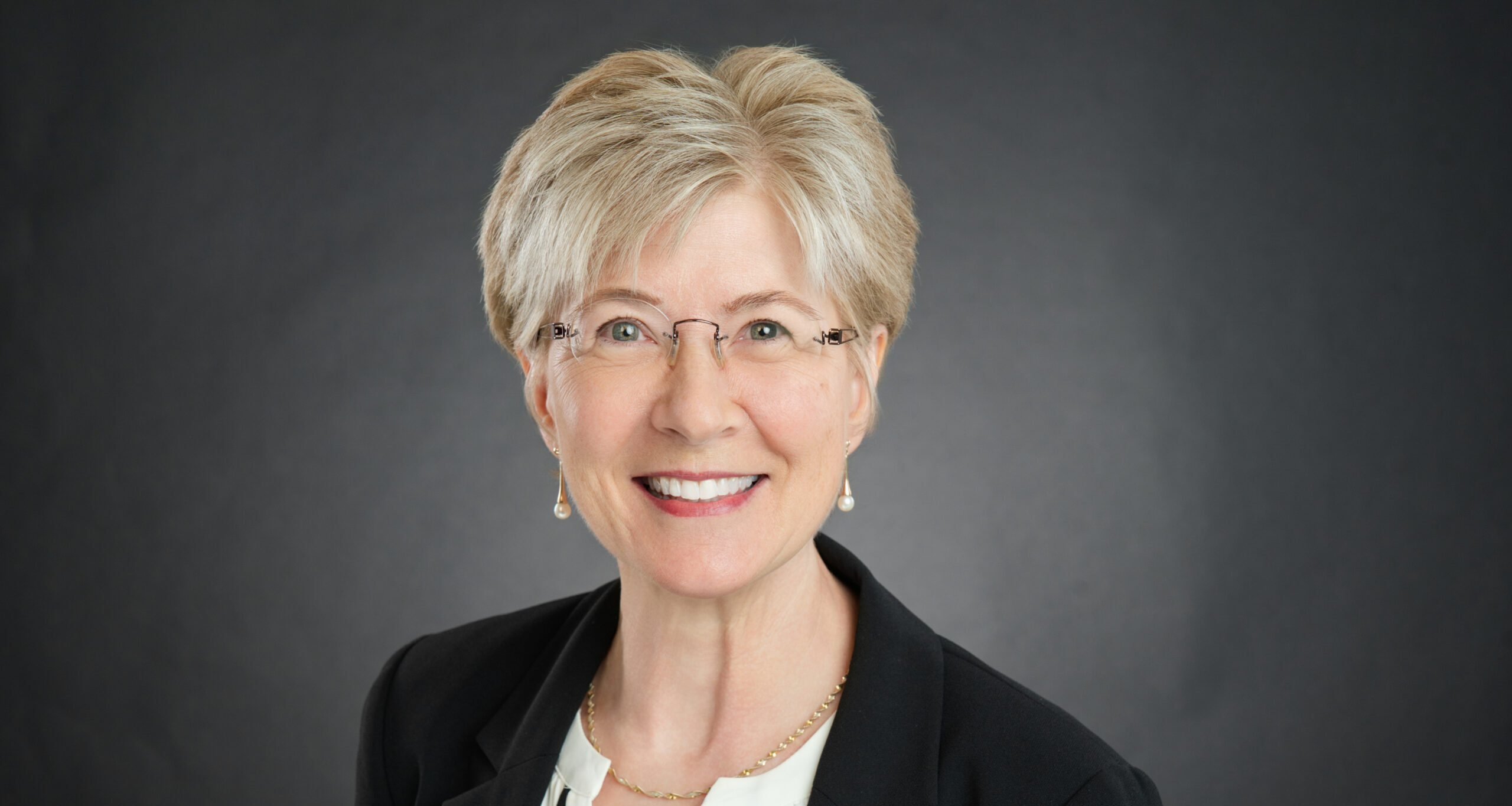 a studio portrait of Suzanne Baker